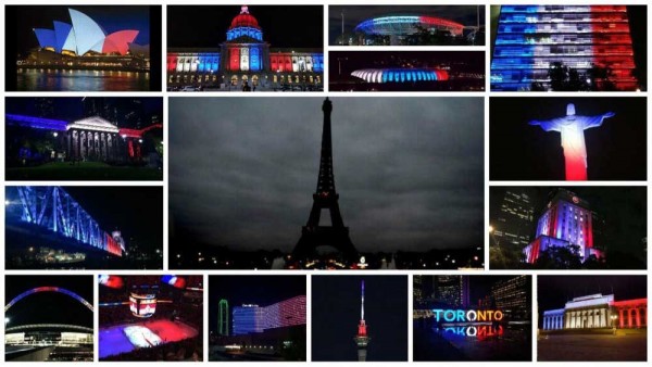 gebouwen verlicht in de kleuren van de Franse vlag